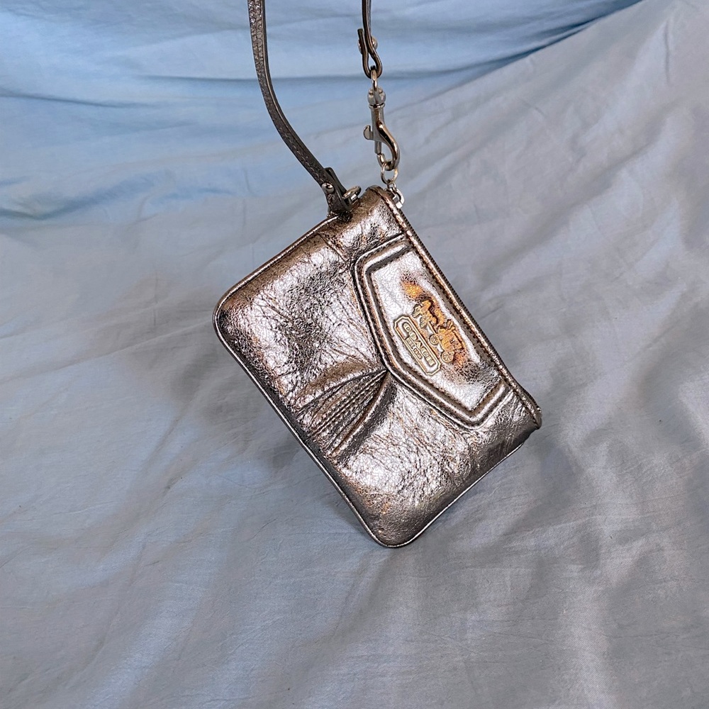 Adorable Metallic silver Coach wristlet